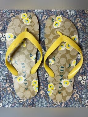 Coach Beige Signature Flip Flops with Yellow Straps and Floral Print